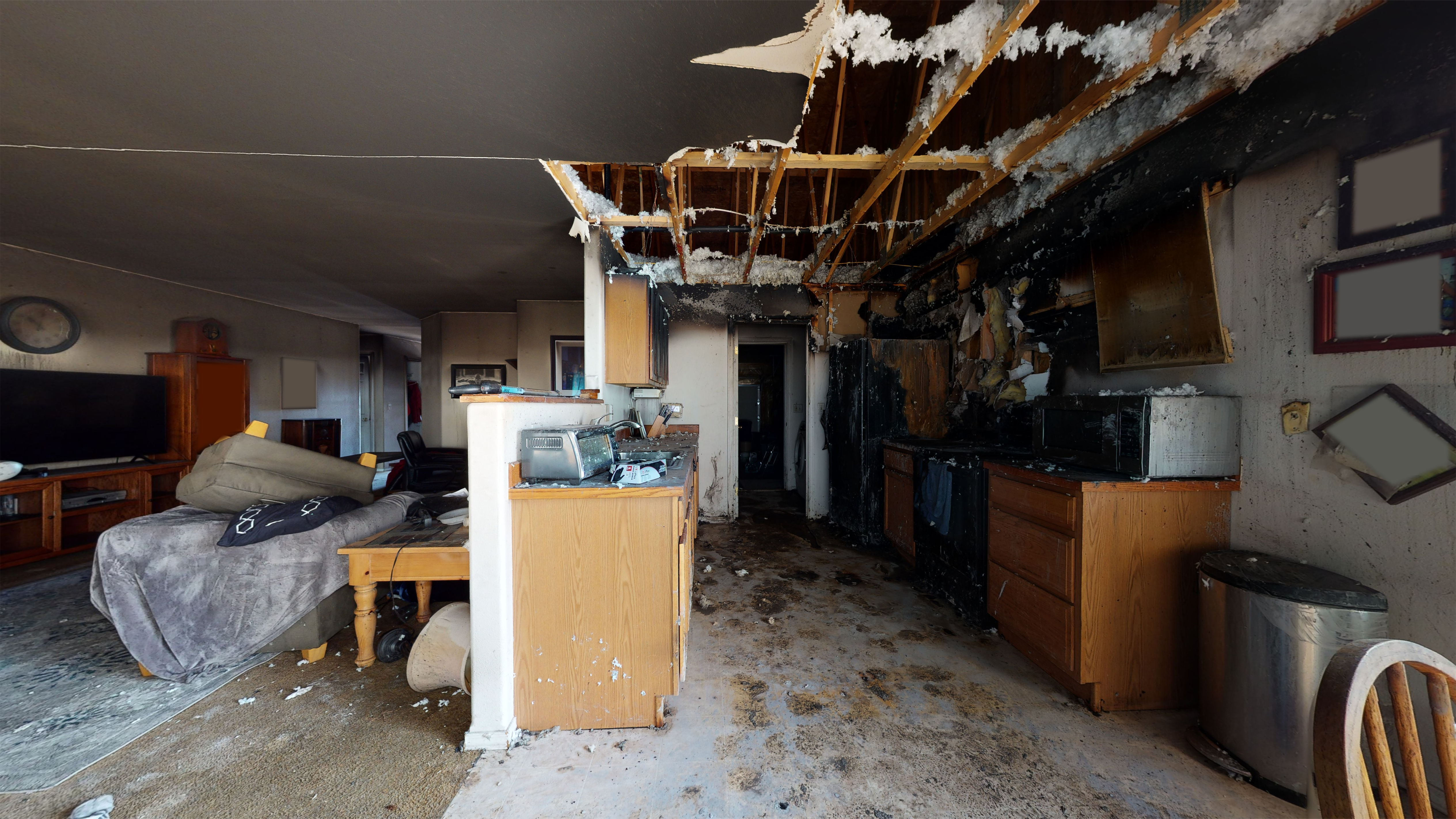 Wheeler Before Kitchen damaged after house fire